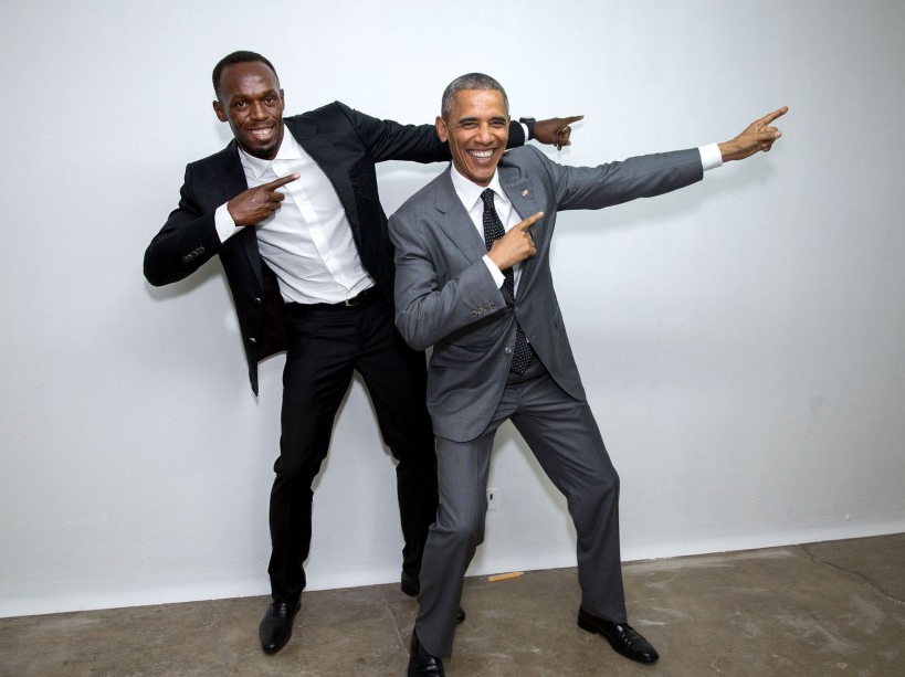 Backstage, the President mimics the victory pose with Usain Bolt, the fastest runner in the world. Bolt, the Jamaican sprinter, attended the town hall. (Official White House Photo by Pete Souza)