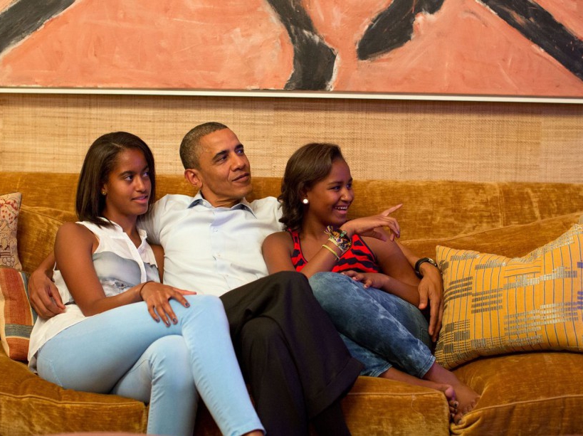 President Barack Obama and his daughters, Malia, left, and Sasha, watch on television as First Lady Michelle Obama takes the stage to deliver her speech at the Democratic National Convention, in the Treaty Room of the White House, Tuesday night, Sept. 4, 2012. (Official White House Photo by Pete Souza)